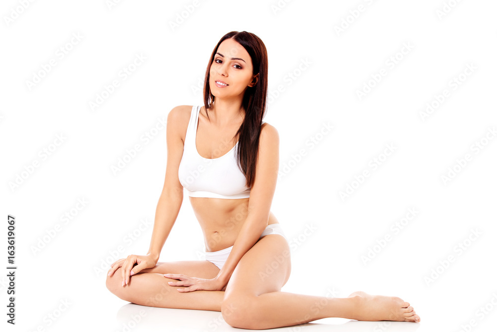 Young, sporty, fit and beautiful girl in sporty underwear. Young, sporty, fit and beautiful girl in sporty underwear.
