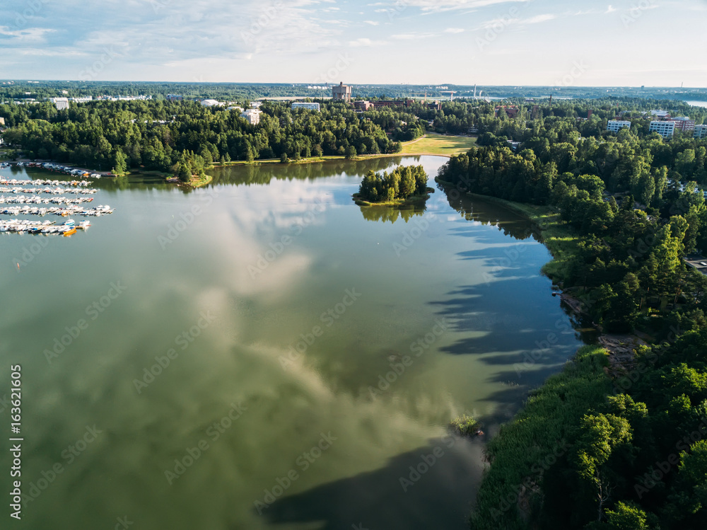 Aerial view of Beautiful reflections in a bay with boats and boats