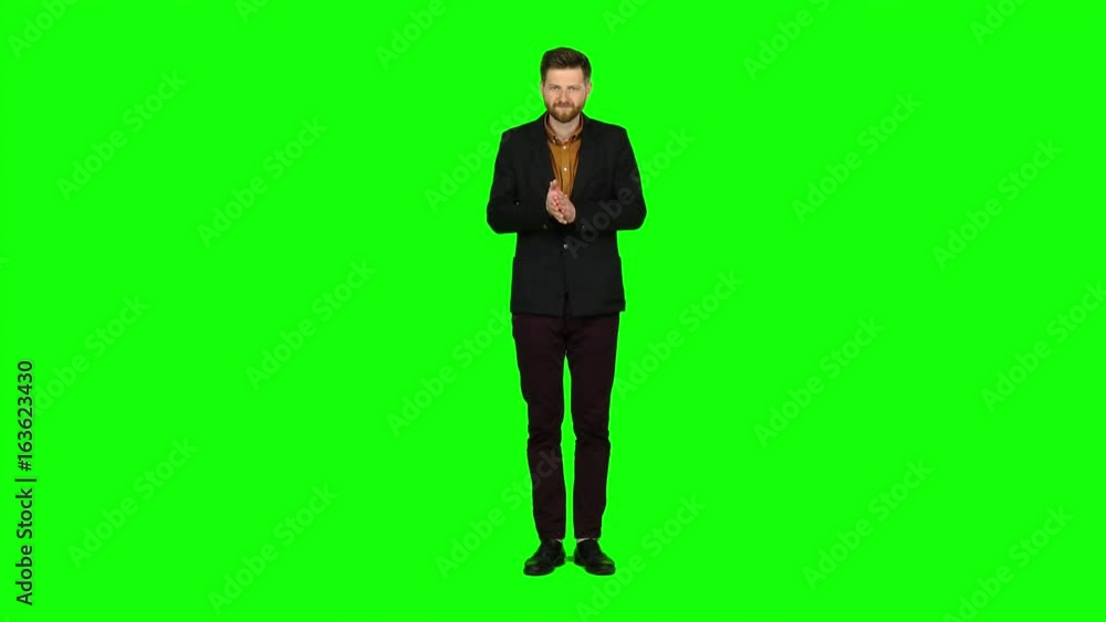 Young guy is happy with his victories, he is happy. Green screen Young guy is happy with his victories, he is happy. Green screen