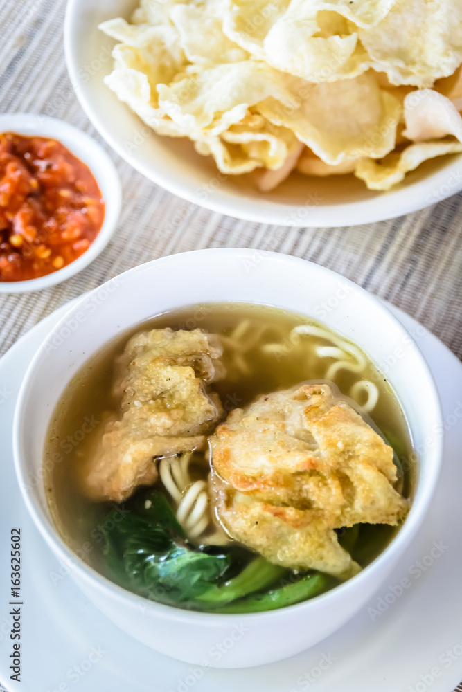 noodle soup with fried dumpling and vegetables noodle soup with fried dumpling and vegetables