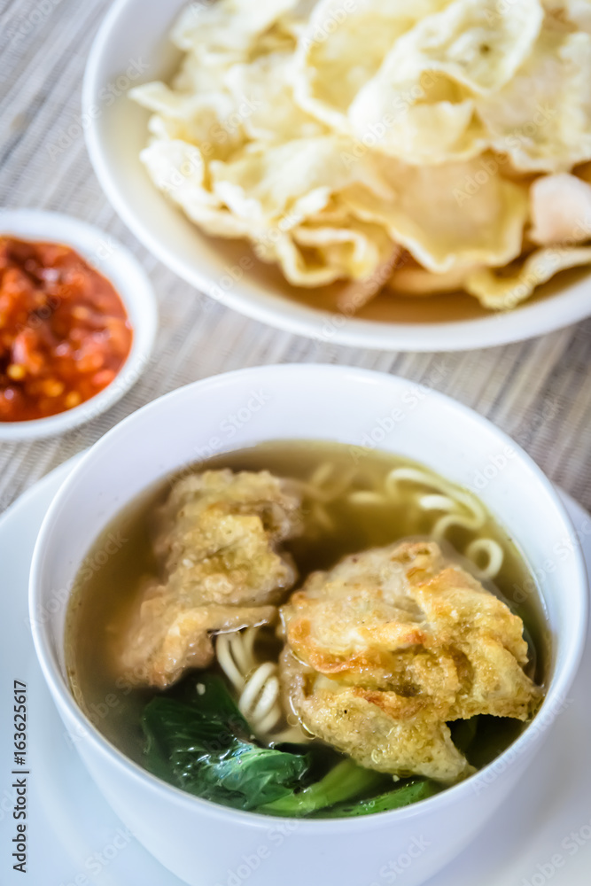 noodle soup with fried dumpling and vegetables noodle soup with fried dumpling and vegetables