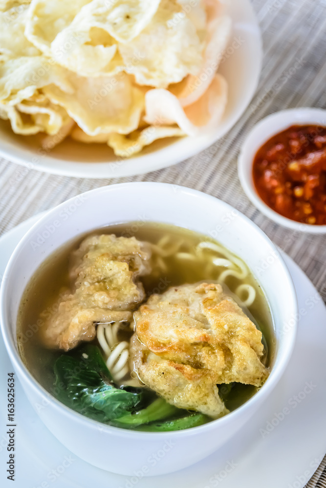 noodle soup with fried dumpling and vegetables noodle soup with fried dumpling and vegetables