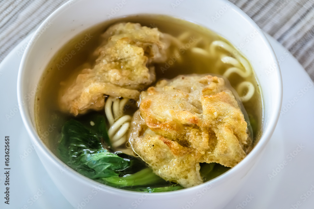 noodle soup with fried dumpling and vegetables noodle soup with fried dumpling and vegetables