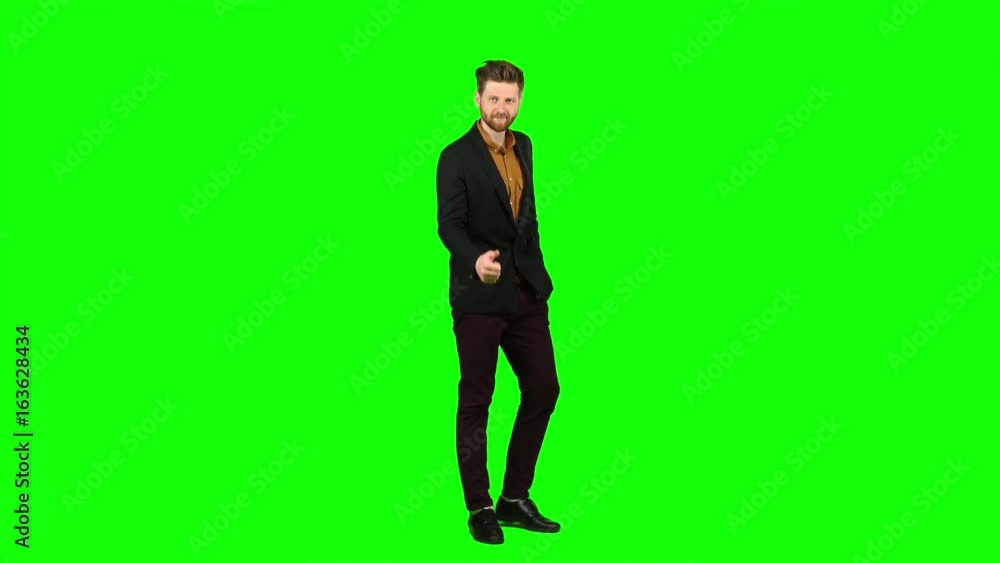 Male businessman showing thumbs up, he likes everything. Green screen Male businessman showing thumbs up, he likes everything. Green screen