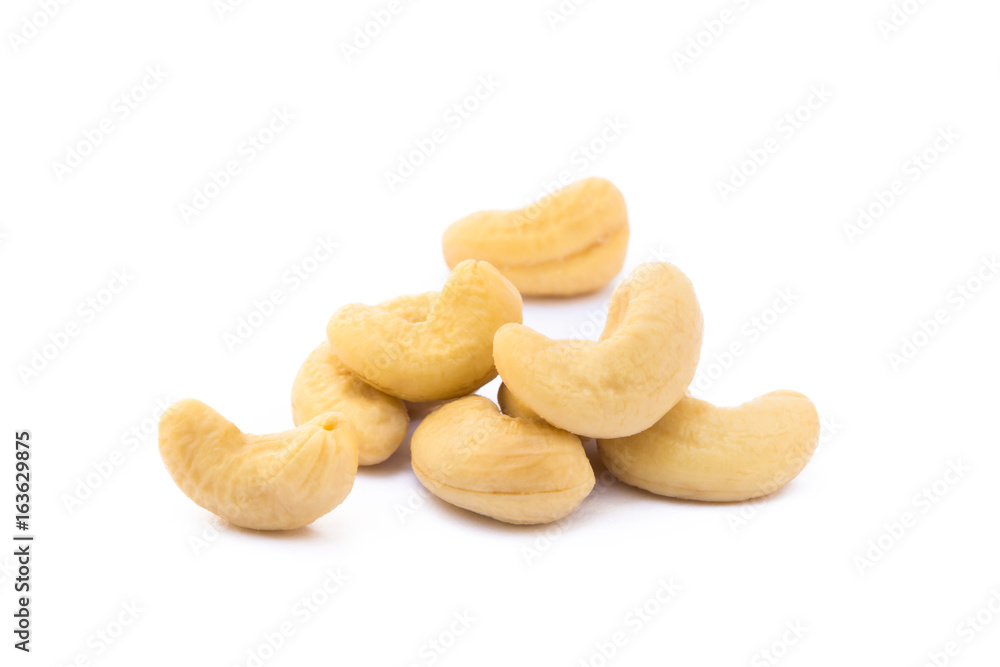 Fototapeta premium Roasted salted cashews isolated on a white background