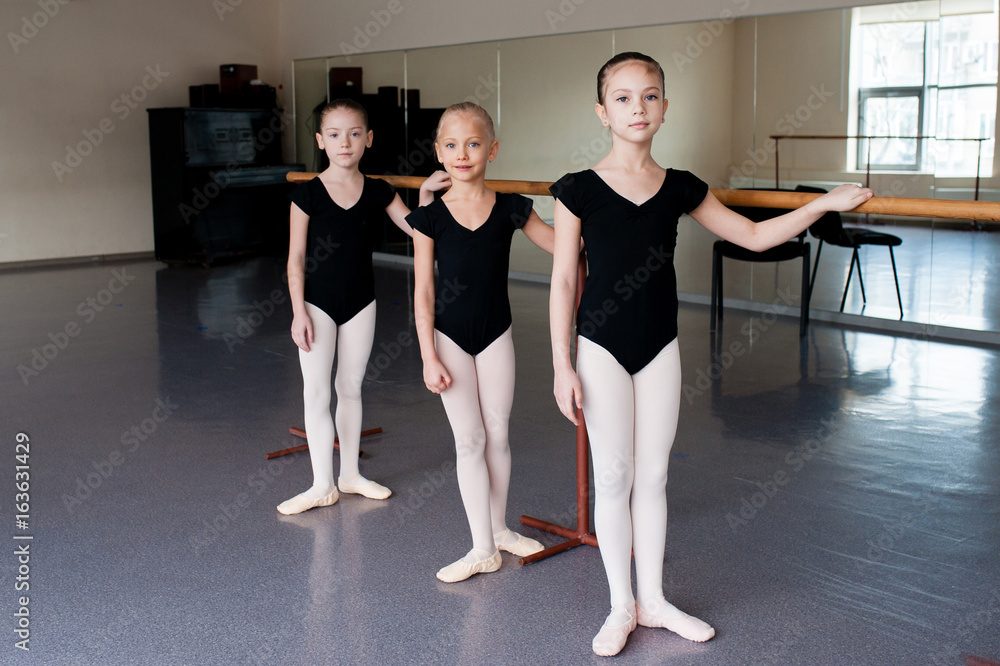 Girls are engaged in choreography in the ballet class. Girls are engaged in choreography in the ballet class.