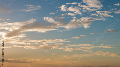 Sky at sunset and sunrise. Sunset behind mountain. Golden sky