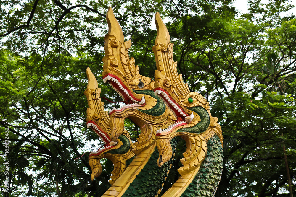 Naga sculpture in Lao temple, Laos Naga sculpture in Lao temple, Laos