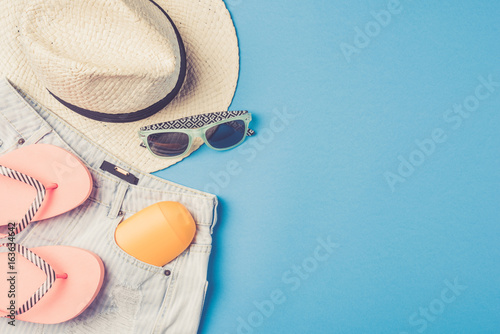 Woman's beach outfit. Summer fashion background