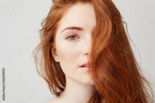 Portrait of redhead young woman photo