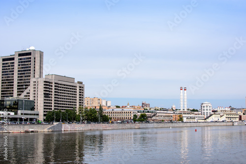 View across the river to the embankment of the old town © photozhukov