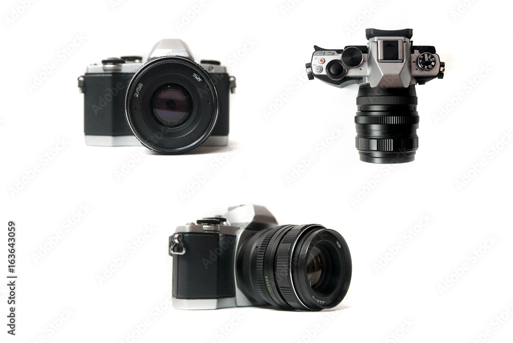 Retro camera with metal lens on white background