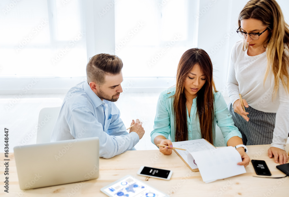 Creative business people working together Creative business people working together