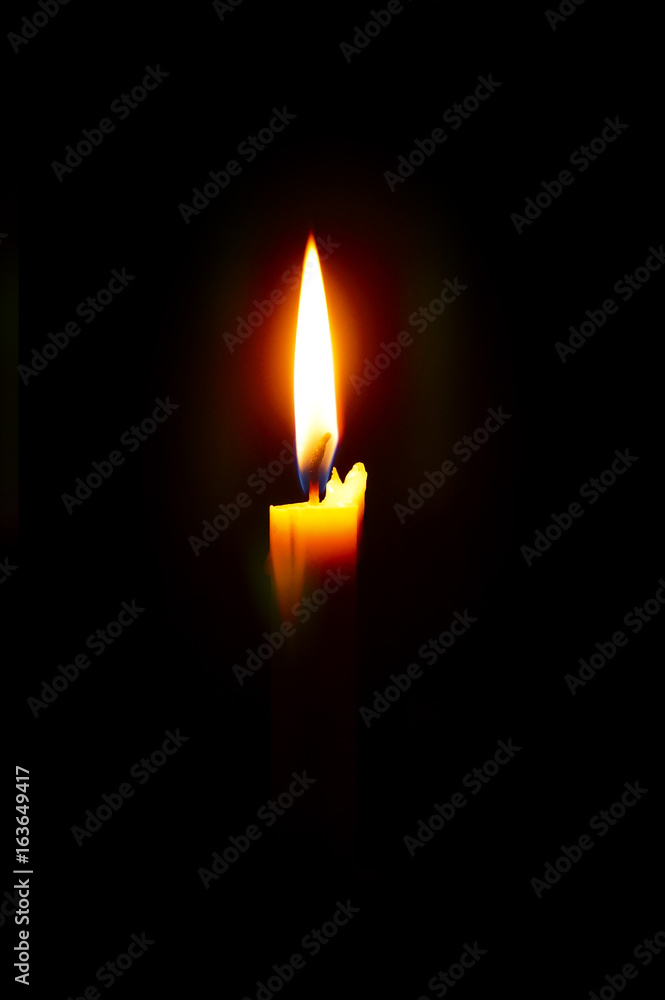 isolated Burning Candle In The Dark isolated Burning Candle In The Dark