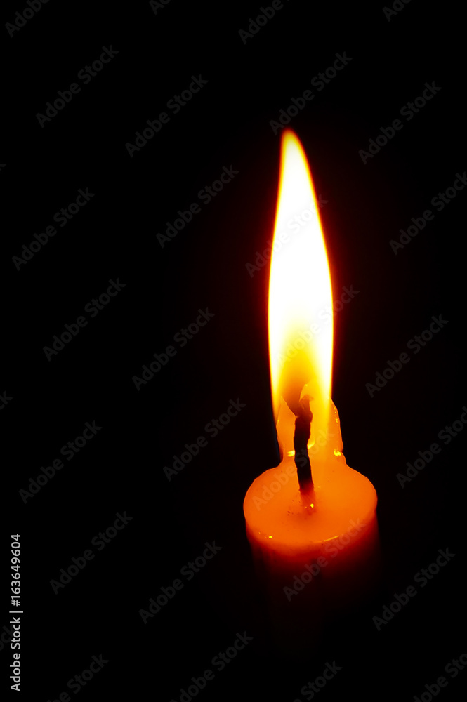 isolated Burning Candle In The Dark isolated Burning Candle In The Dark