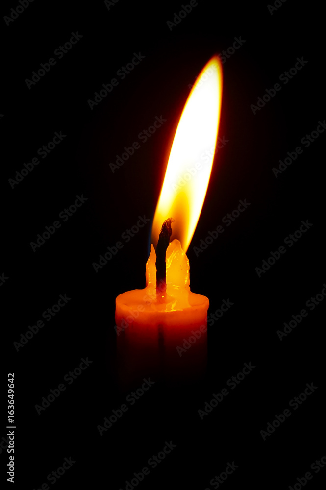 isolated Burning Candle In The Dark isolated Burning Candle In The Dark