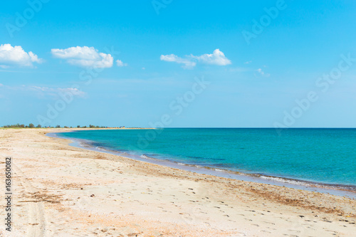 Tropical beach with sand, summer holiday background. © fotofabrika