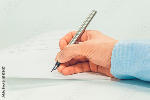 Person hand sign document