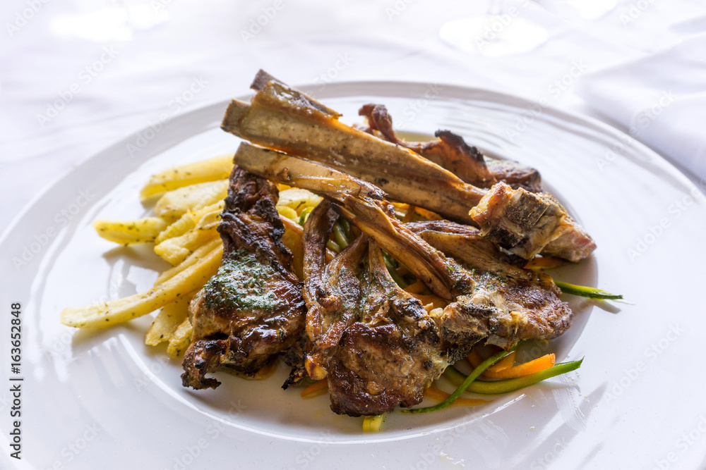 juice roasted lamb chops on the table