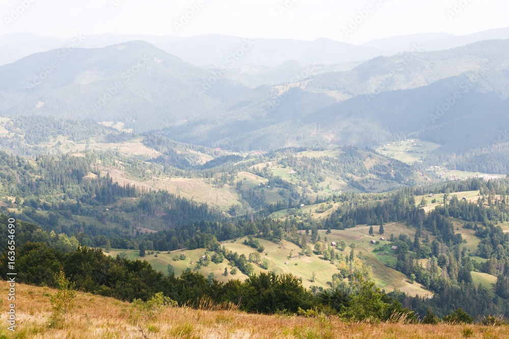Mountain landscape with hills and forests