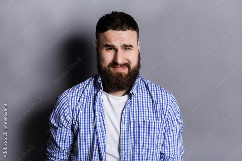 Fototapeta premium Feeling upset, sad bearded man portrait