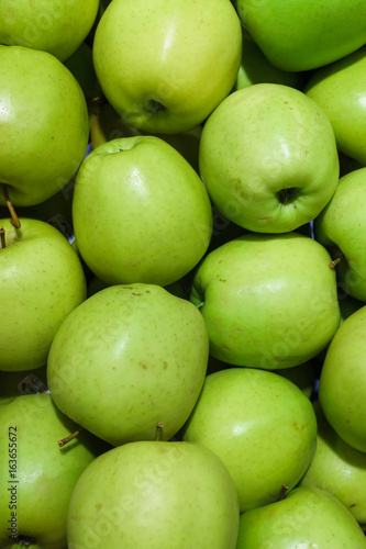 Beet, ripe, green apples in a box.