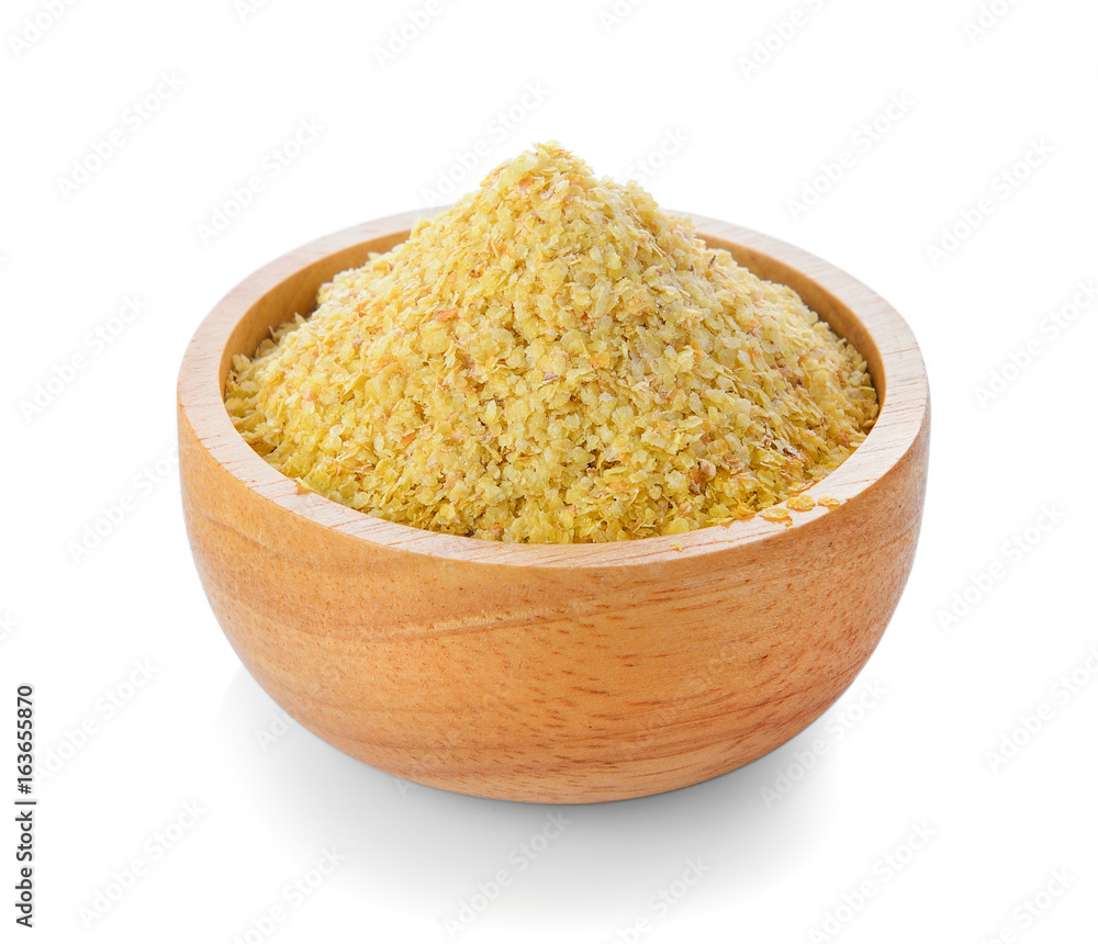 Wheat germ in wood bowl on white background Wheat germ in wood bowl on white background