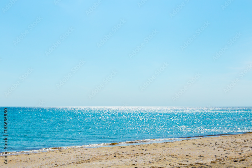 Tropical beach with sand, summer holiday background. Tropical beach with sand, summer holiday background.