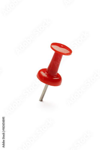 close up of a pushpin on white background