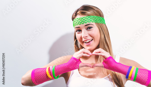 Woman in 1980's fashion on a white background
