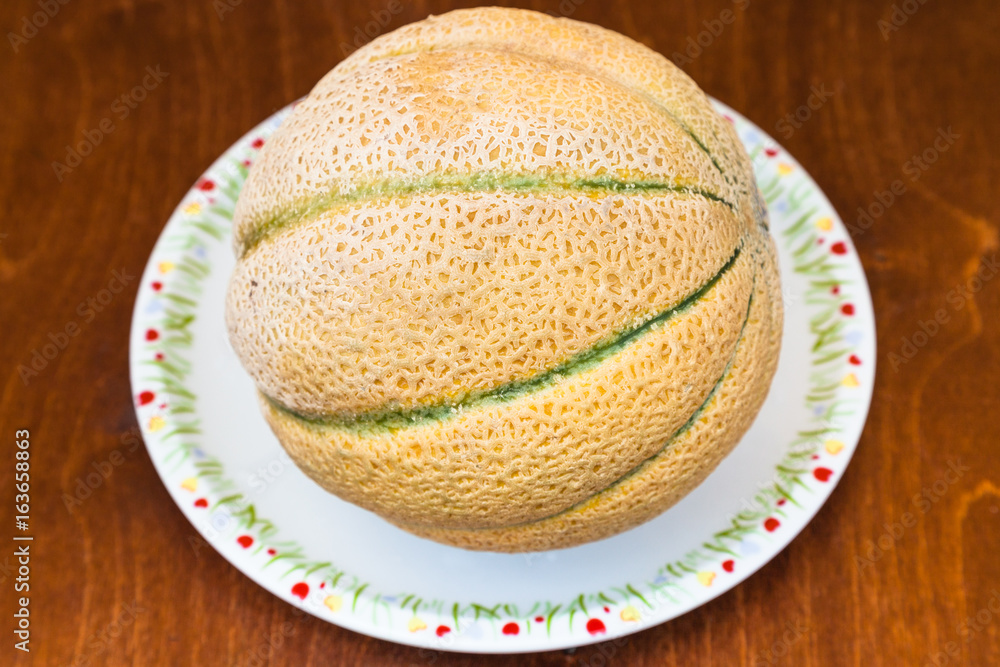ripe sicilian melon cantaloupe on plate ripe sicilian melon cantaloupe on plate