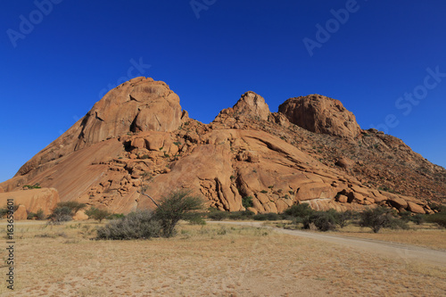 Spitzkoppe, aka Sptizkop - unique rock formation in Damaraland landscape, Namibia, Africa.