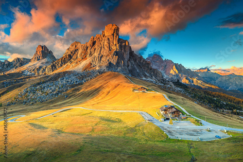 Fantastic alpine pass with high peaks in background, Dolomites, Italy