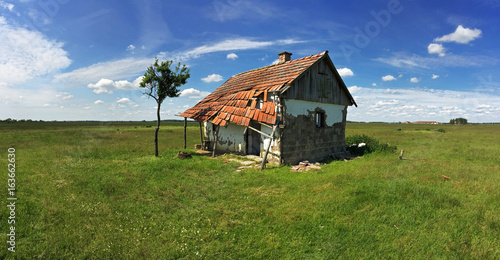 Abandoned cottage in the World Heritage Site Hortobagy National Park district, Great Plain, Hungary photo
