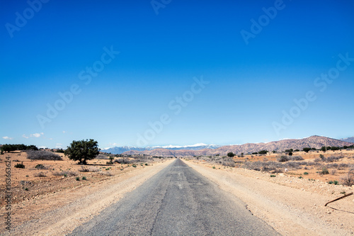 Road to the Atlas mountains in desert  Morocco