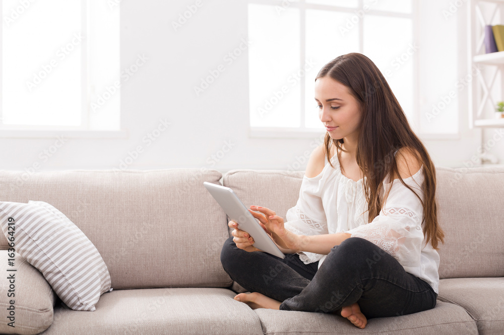 Girl at home surfing the Web Girl at home surfing the Web
