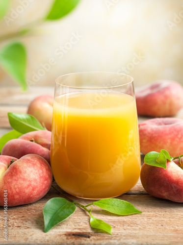 Fresh peaches juice in glass
