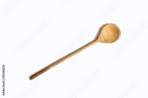 Wooden spoon isolated on white background. Cooking time kitchen.