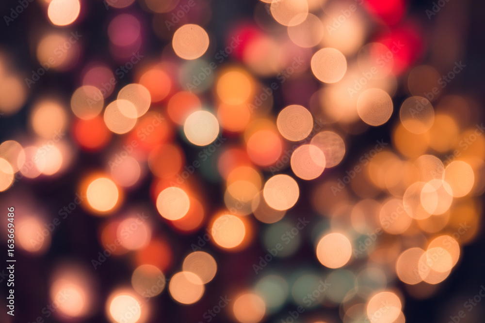 Fototapeta premium Vintage tone bokeh on dark romantic magic night background colorful.