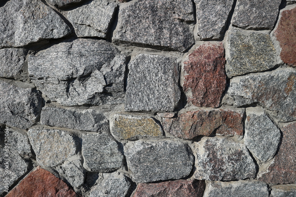 Rubble gray and brown stone wall, rubblework Rubble gray and brown stone wall, rubblework