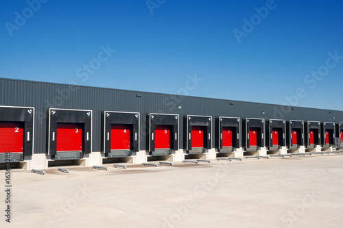 Row of loading docks with shutter doors at a warehouse