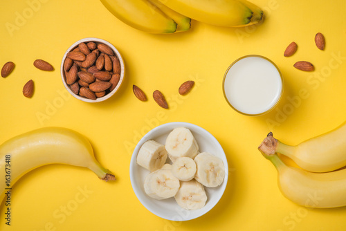Fresh banana with milk and almonds.