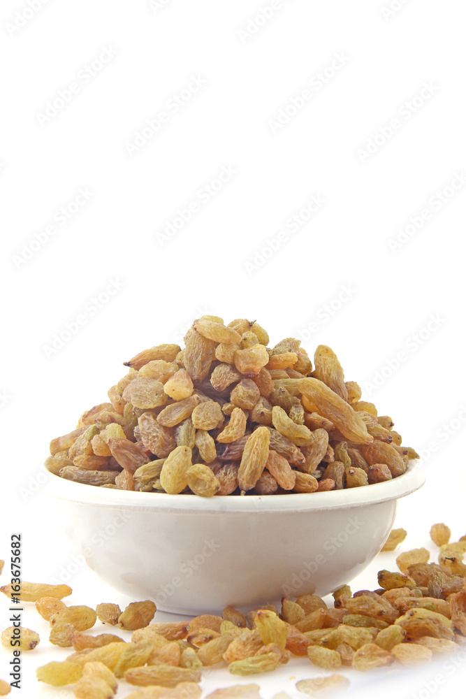 Raisin In White Bowl on White background Raisin In White Bowl on White background