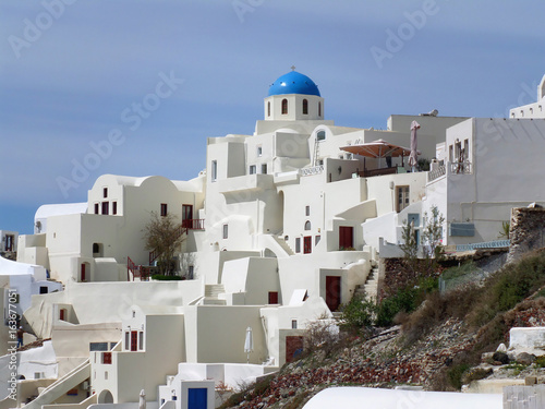 White and blue colored unique architecture at Oia village on Santorini island of Greece