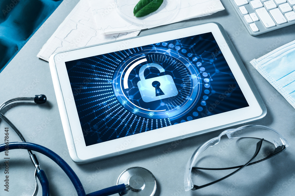 Web security and technology concept with tablet pc on table Web security and technology concept with tablet pc on table