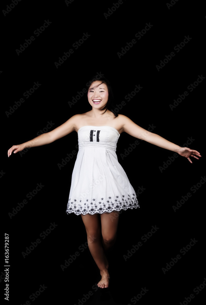 Japanese American Woman Twirling In White Dress Japanese American Woman Twirling In White Dress