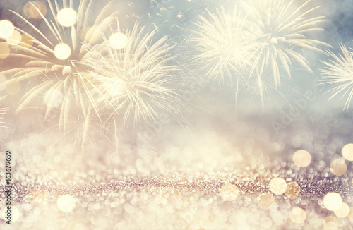 Foto Vintage Fireworks and bokeh in New Year eve and space for text
