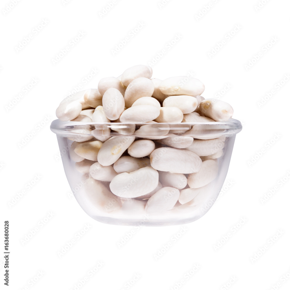 Peanuts in glass saucer on white background. Peanuts in glass saucer on white background.