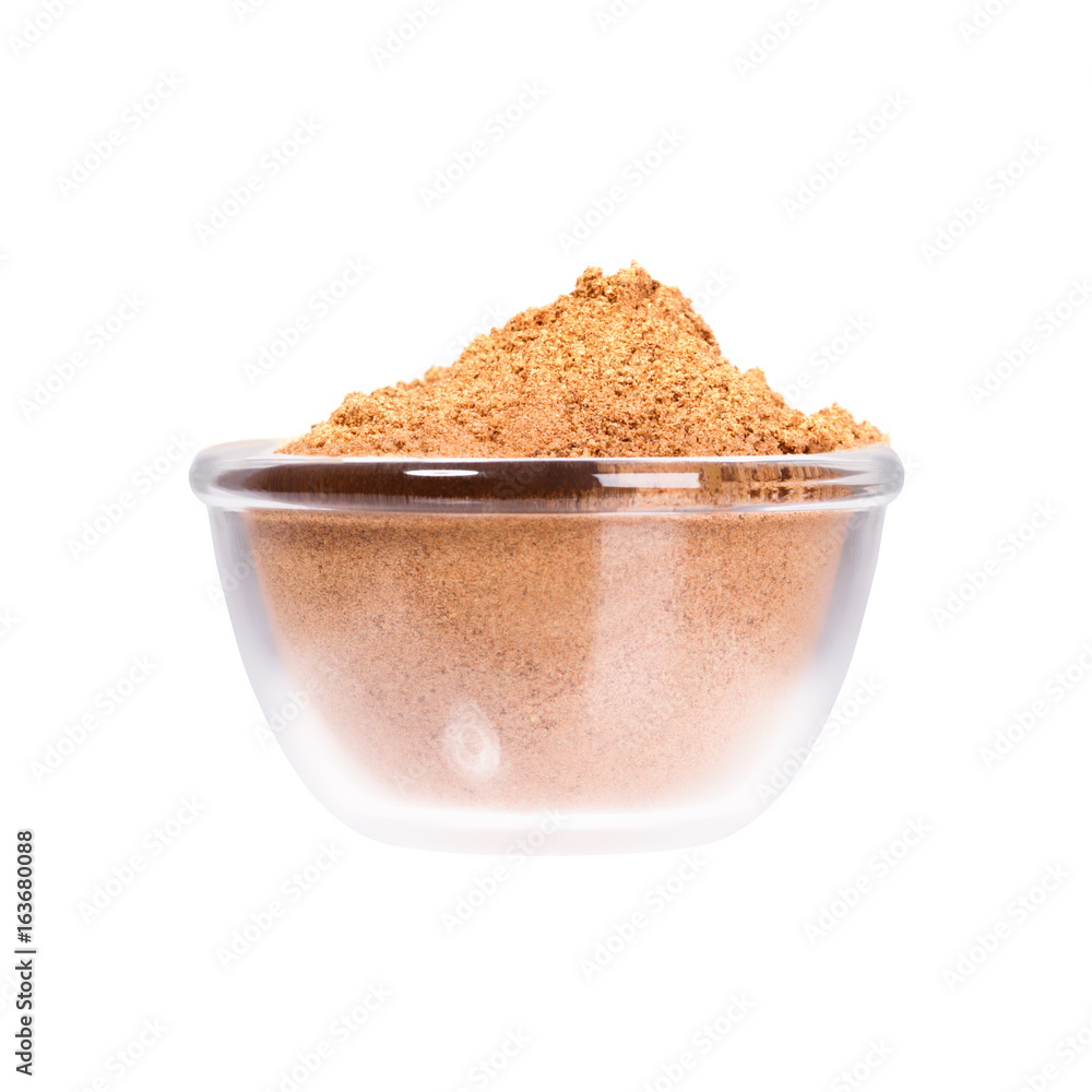 Yellow curry powder in saucepan, macro shot. Yellow curry powder in saucepan, macro shot.