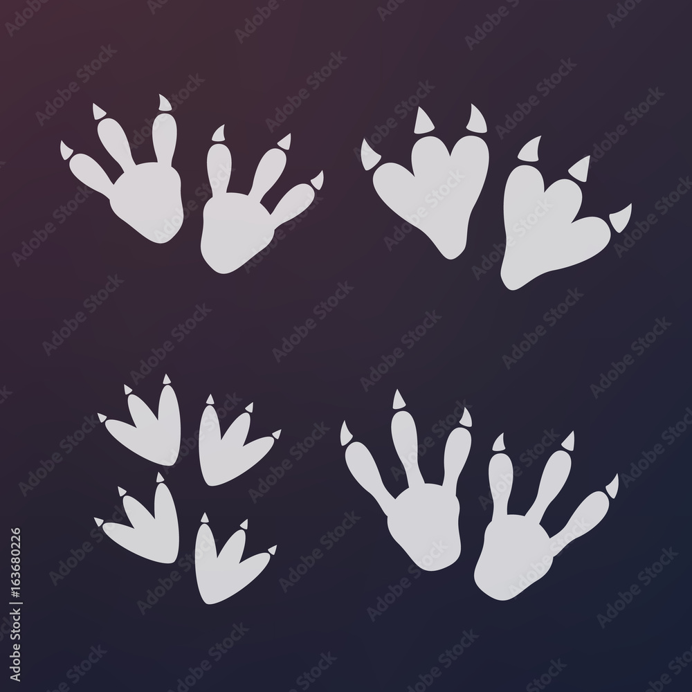 Fototapeta premium Dinosaur footprint tracks black set vector